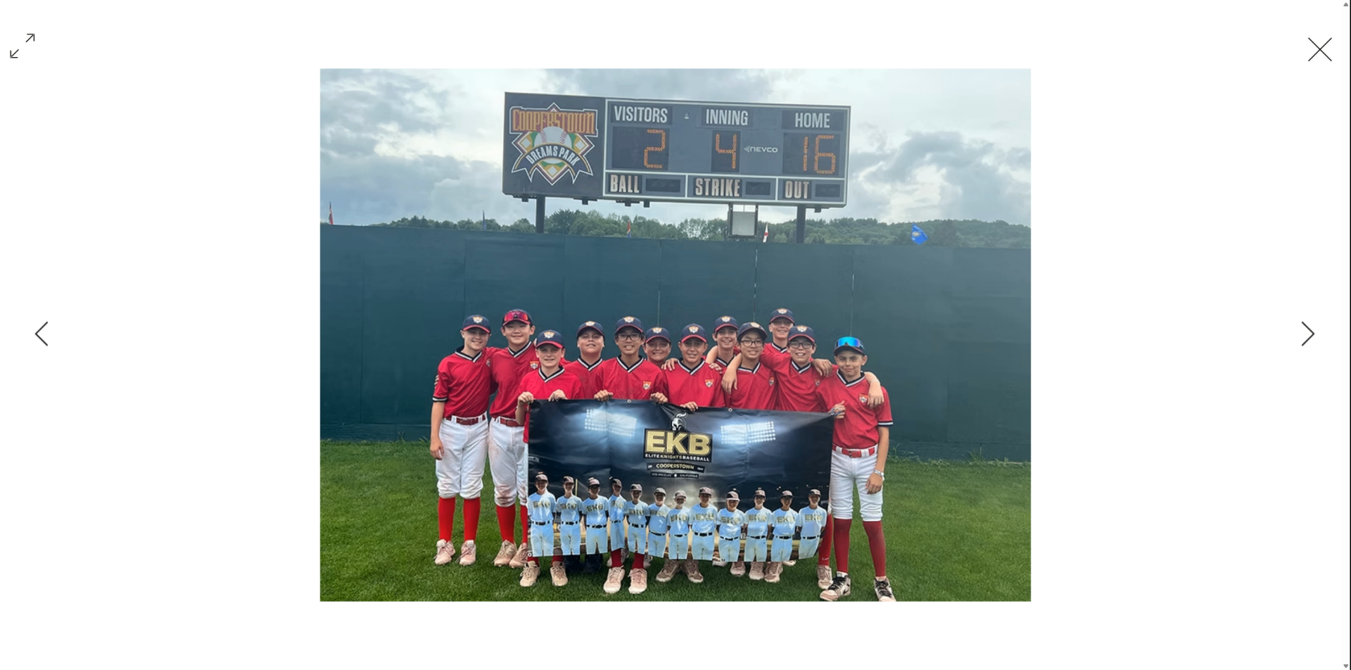 Elite Knights team at Cooperstown Dreams Park scoreboard after a 16-2 win